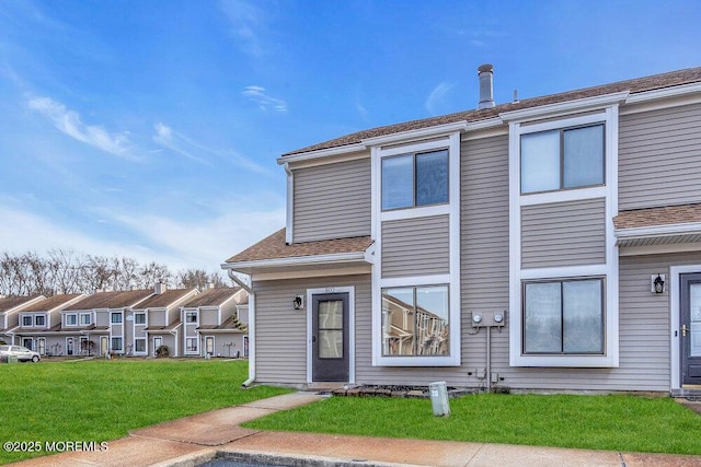 exterior space featuring a front yard