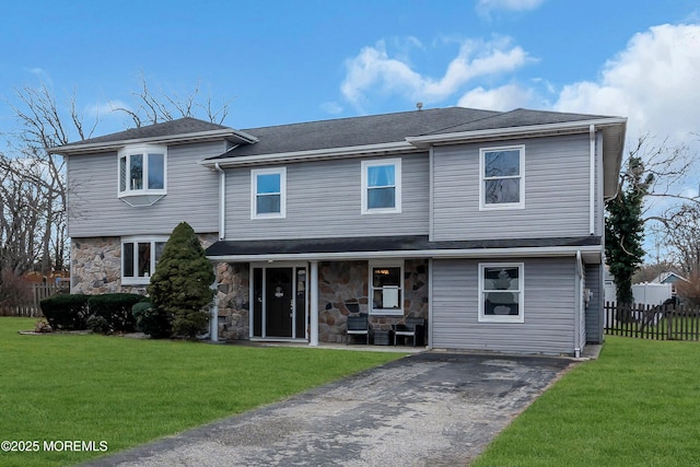 view of property featuring a front yard