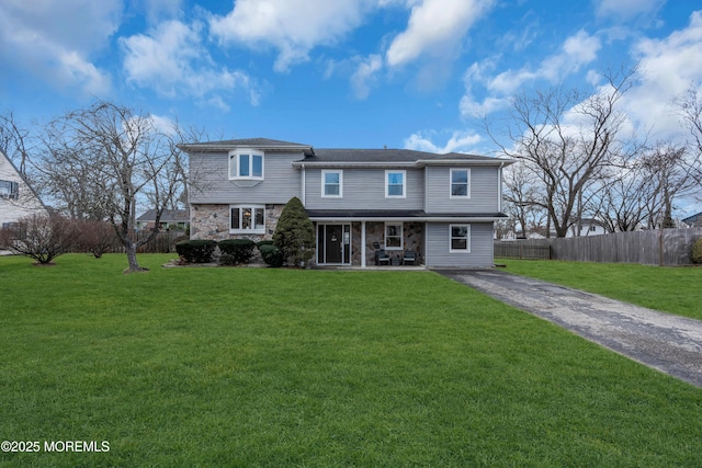 front of property featuring a front lawn