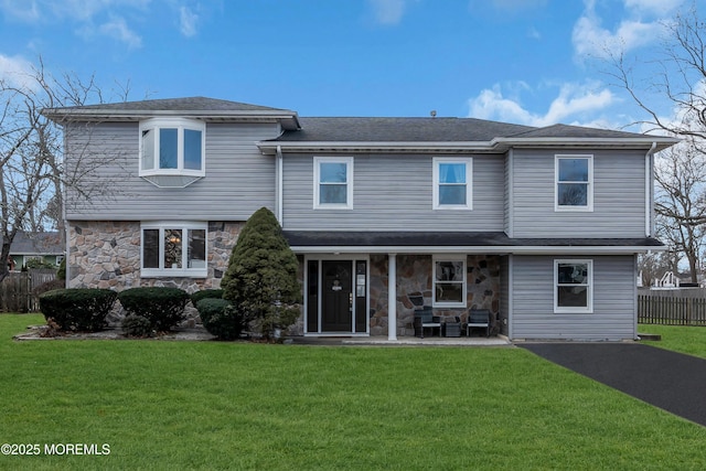 view of front of property with a front lawn