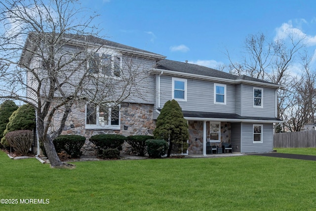 view of front of home with a front yard