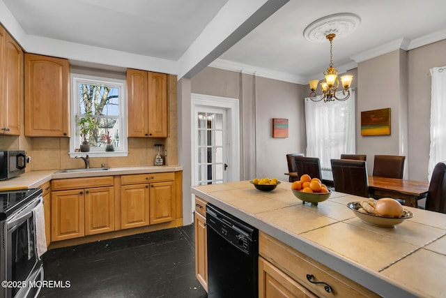 kitchen featuring ornamental molding, tile countertops, sink, and black appliances