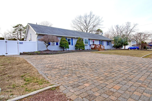 single story home with a front yard