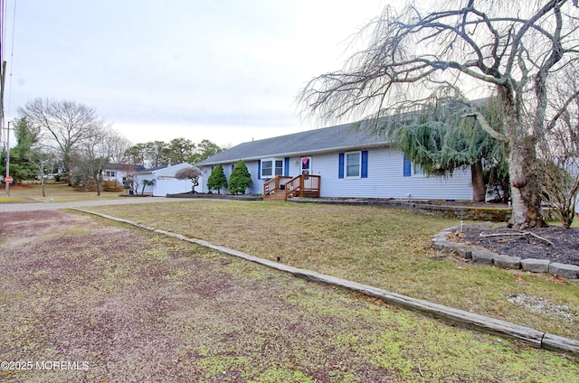 ranch-style house with a front yard