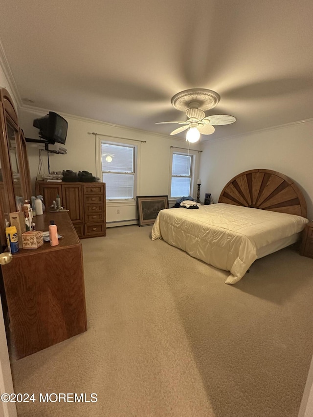 carpeted bedroom featuring ornamental molding, ceiling fan, and baseboard heating