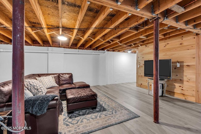 basement featuring hardwood / wood-style floors