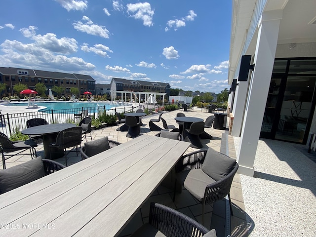 view of patio / terrace featuring a community pool