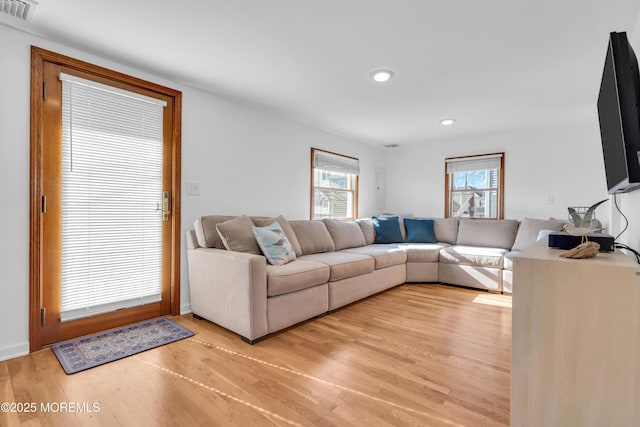 living room featuring light hardwood / wood-style flooring