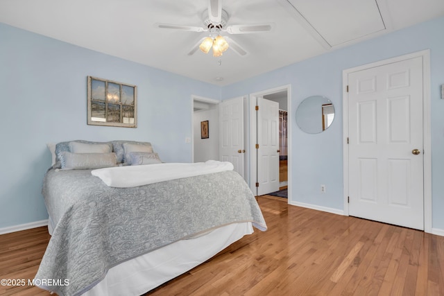 bedroom featuring ceiling fan and hardwood / wood-style floors