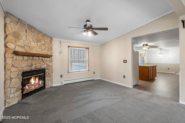 unfurnished living room featuring a fireplace, a baseboard radiator, ceiling fan, and carpet flooring