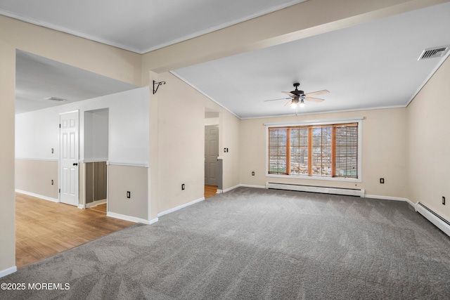 carpeted empty room with a baseboard radiator, ornamental molding, and ceiling fan