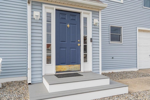 property entrance featuring a garage