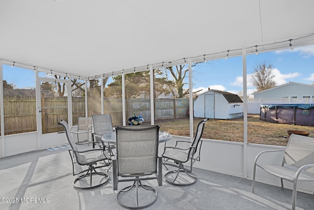 sunroom / solarium featuring a healthy amount of sunlight