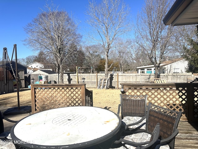 wooden deck with a playground