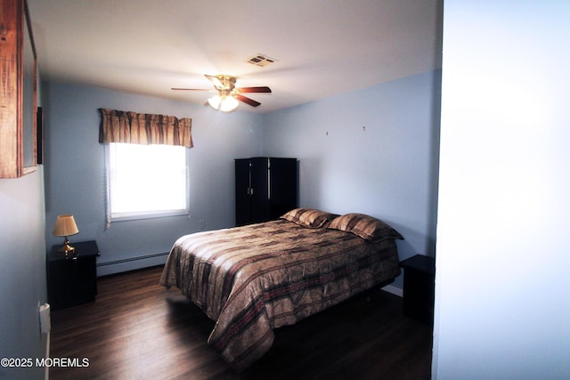 bedroom featuring a baseboard radiator, ceiling fan, and dark hardwood / wood-style flooring