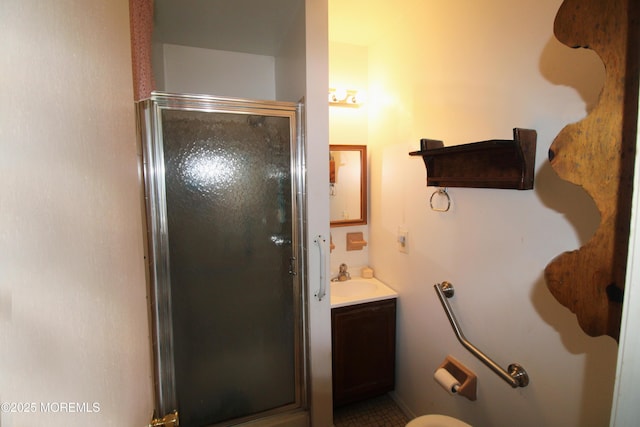 bathroom with vanity and an enclosed shower