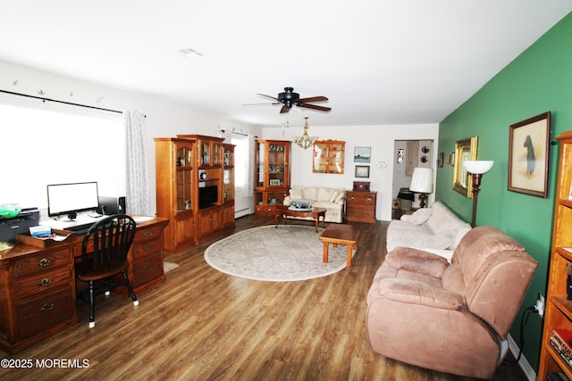 living room featuring hardwood / wood-style flooring, ceiling fan, vaulted ceiling, and a baseboard heating unit