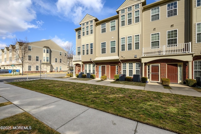 exterior space featuring central AC unit