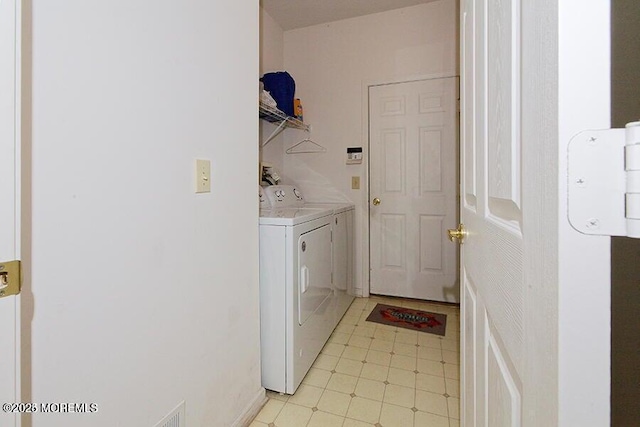 laundry area featuring washer and clothes dryer