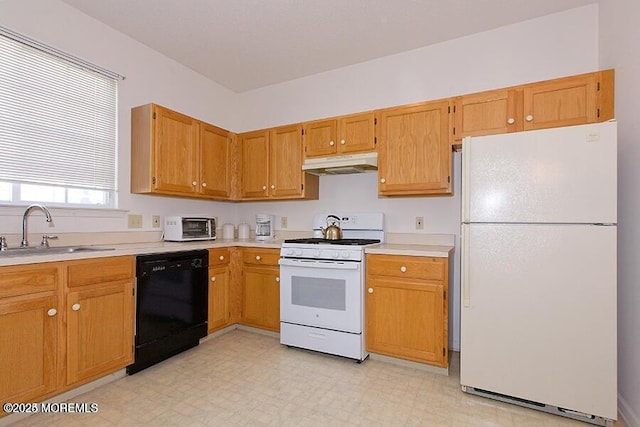 kitchen with sink and white appliances