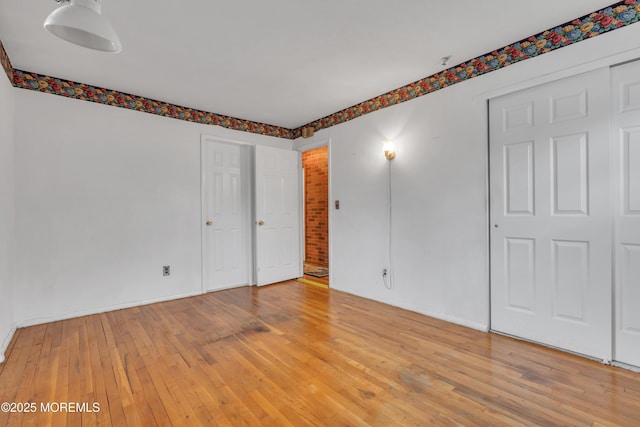 unfurnished bedroom featuring light hardwood / wood-style floors