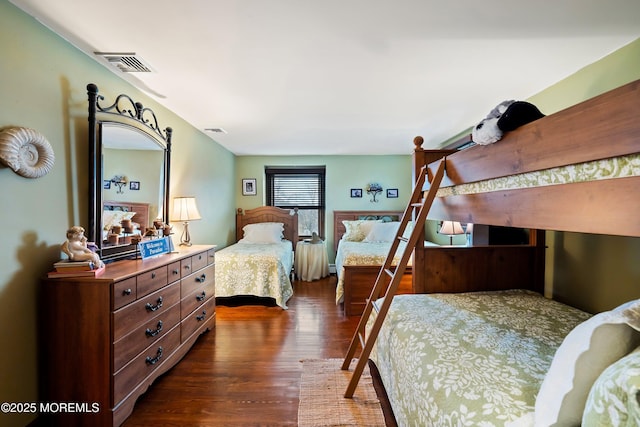 bedroom featuring dark hardwood / wood-style floors