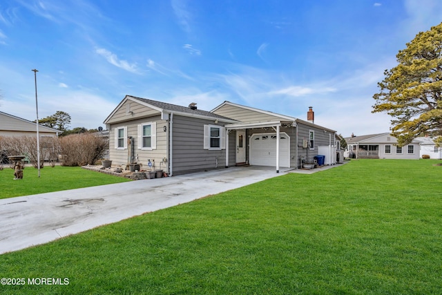 view of front of home with a garage and a front lawn