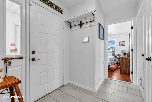 entrance foyer featuring light tile patterned floors