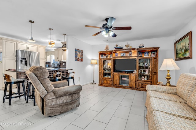 living room with ceiling fan