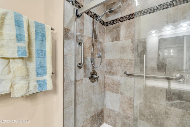 bathroom featuring an enclosed shower