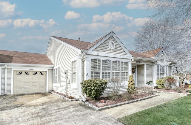 single story home featuring a garage