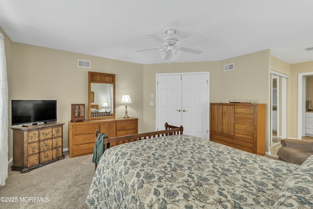 bedroom with light carpet and ceiling fan