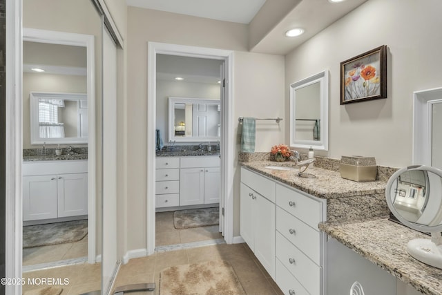 bathroom featuring vanity and tile patterned floors