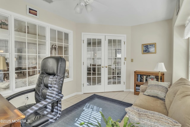 interior space with french doors and ceiling fan