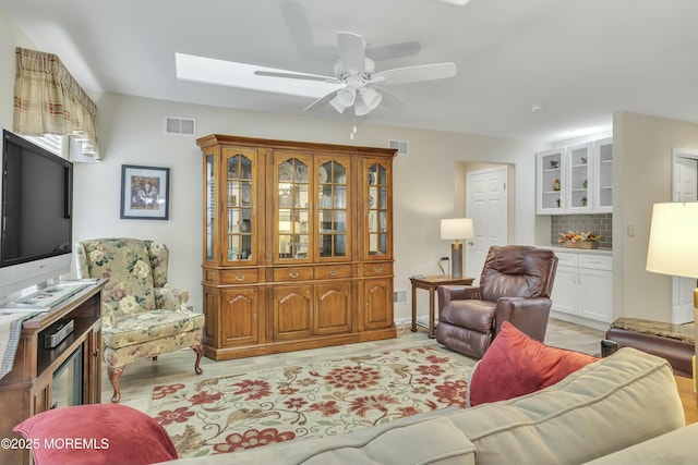 living room with ceiling fan