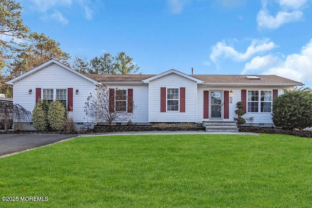 ranch-style home with a front yard