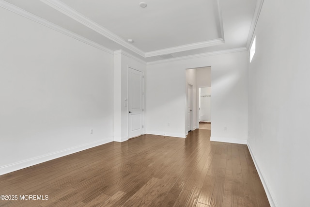 unfurnished room with dark wood-type flooring and crown molding