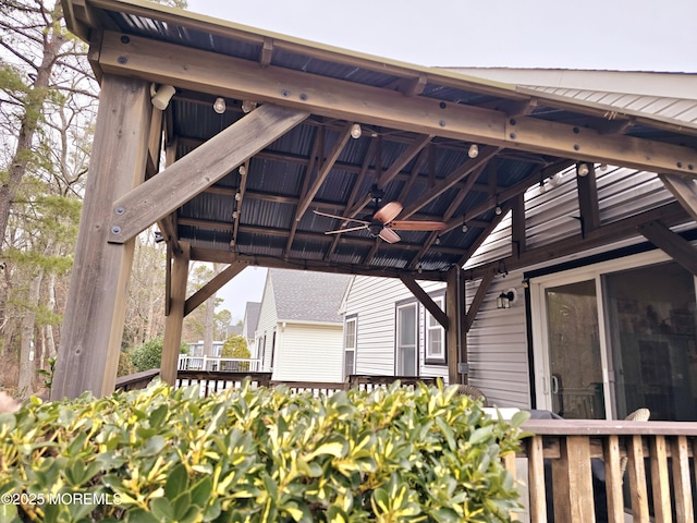 view of patio featuring a wooden deck and ceiling fan