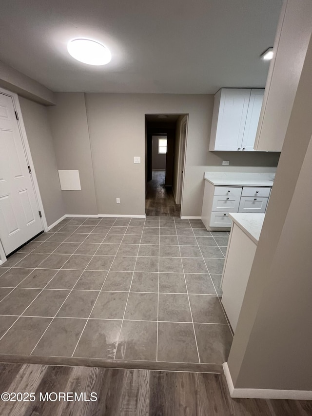 washroom with light tile patterned floors