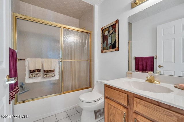 full bathroom featuring tile patterned flooring, bath / shower combo with glass door, vanity, and toilet