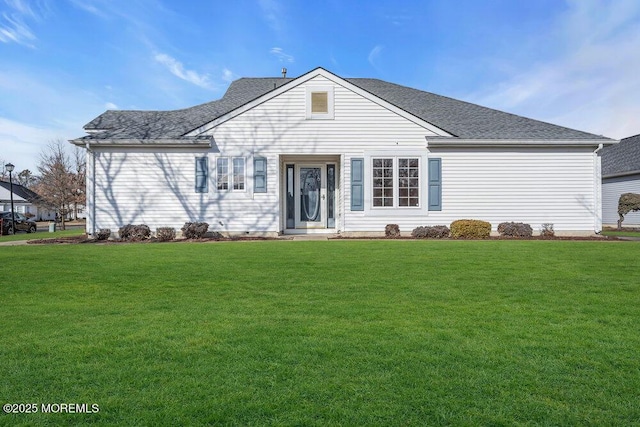 view of front facade with a front lawn