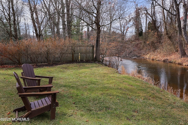 view of yard with a water view