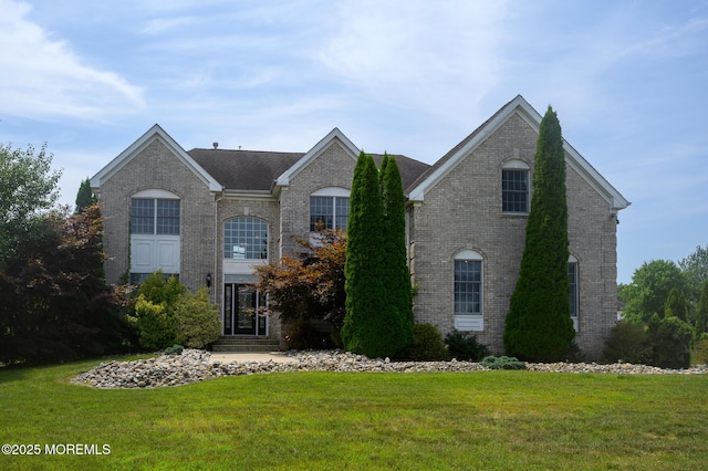 view of property with a front lawn