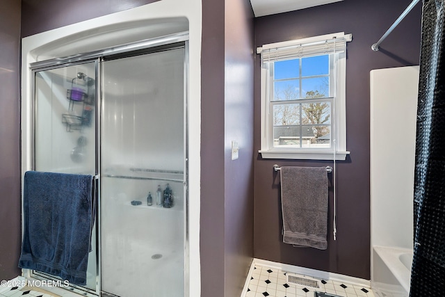 bathroom featuring plus walk in shower