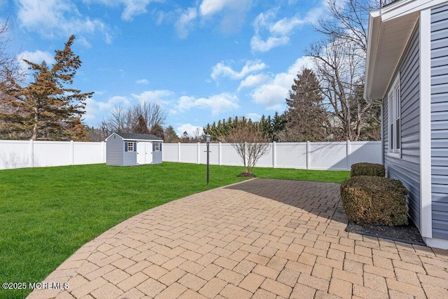 view of patio / terrace with a shed