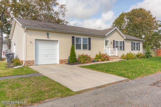 ranch-style home with a garage and a front lawn