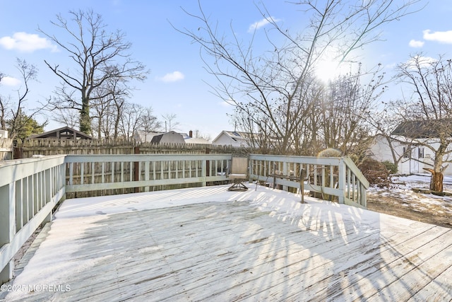 view of snow covered deck