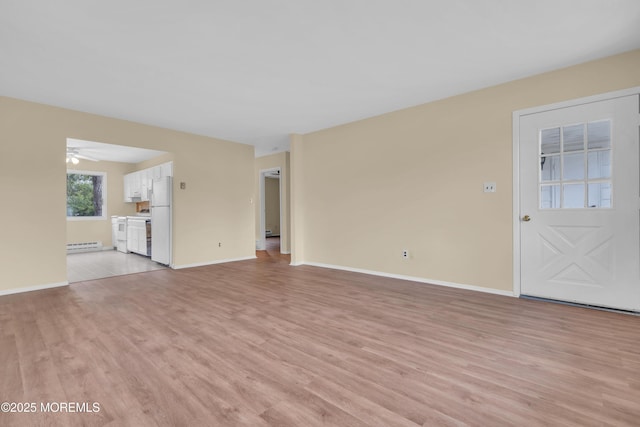 unfurnished living room with light hardwood / wood-style flooring, ceiling fan, and baseboard heating