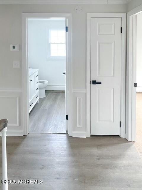 corridor featuring light hardwood / wood-style flooring