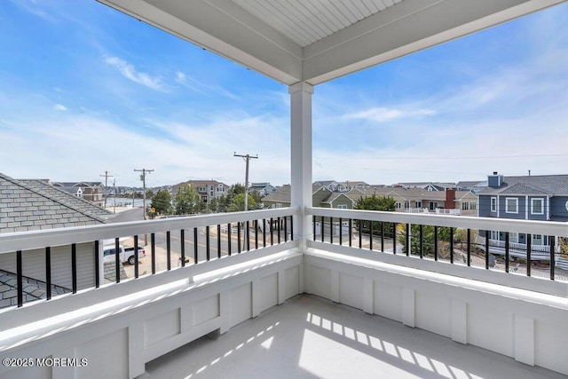 balcony featuring a residential view